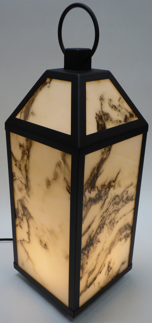 sterno home led lantern with marble finish turned on